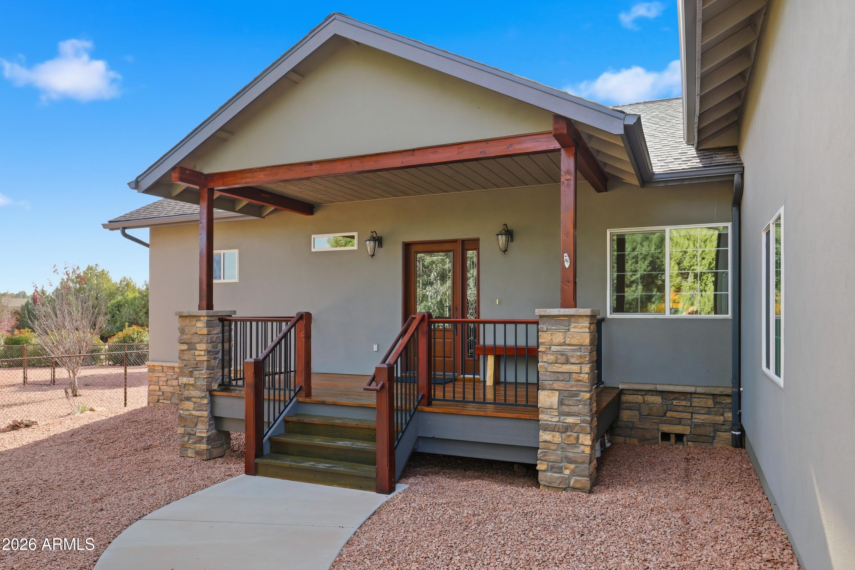 1703 West Dillon Way Payson, AZ 85541 - Photo 2 of 56 a view of a house with wooden floor and a roof