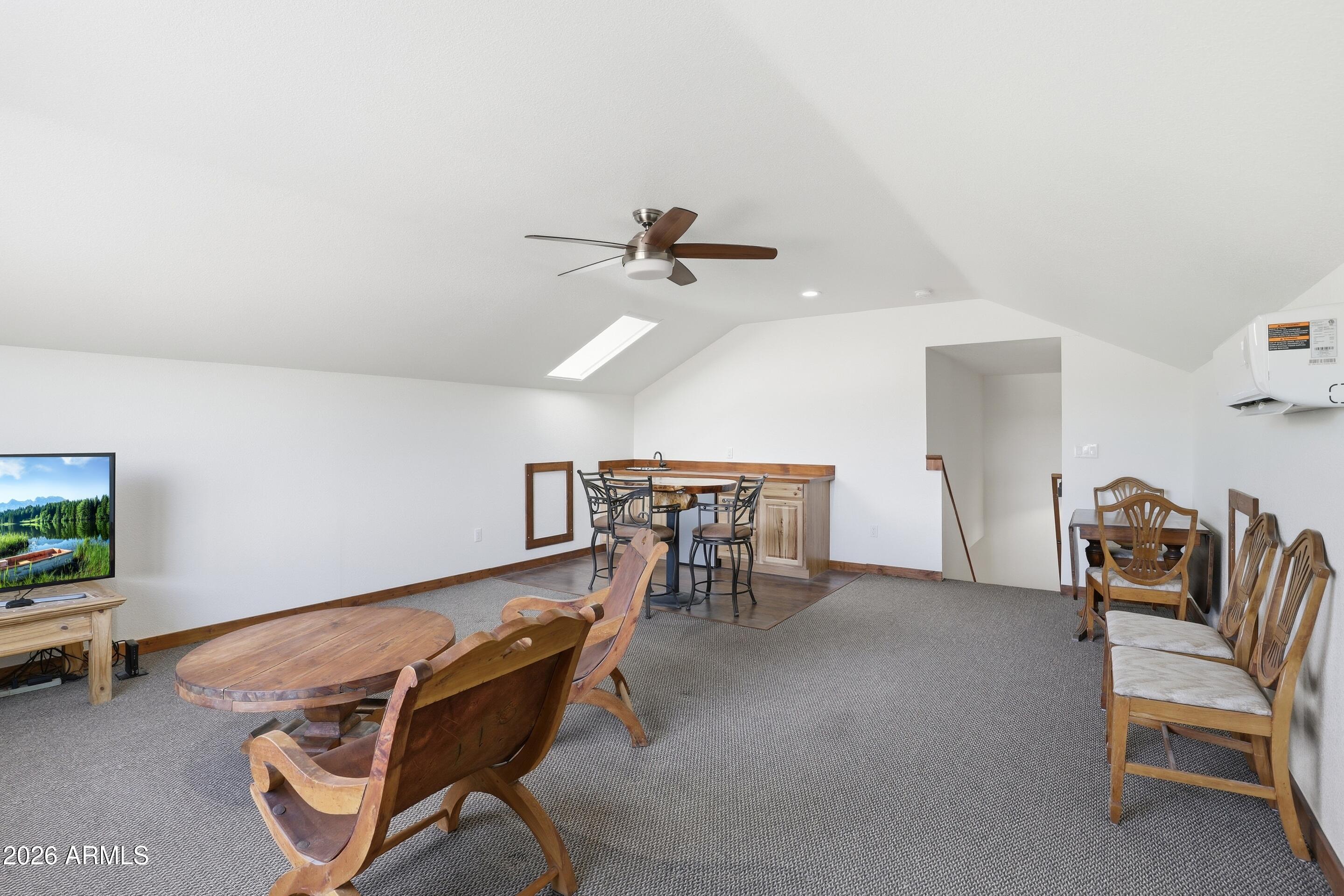 1703 West Dillon Way Payson, AZ 85541 - Photo 27 of 56 a living room with furniture and a ceiling fan