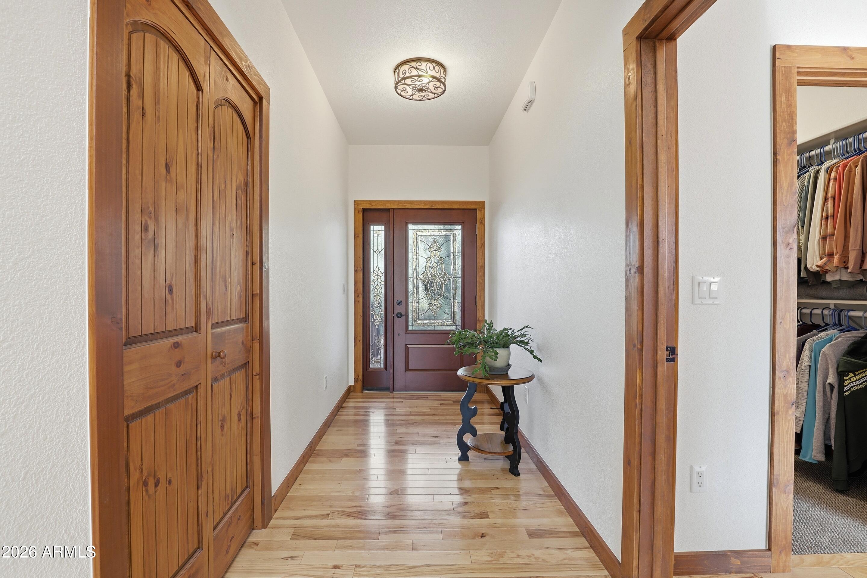 1703 West Dillon Way Payson, AZ 85541 - Photo 4 of 56 a view of a hallway with wooden floor and staircase