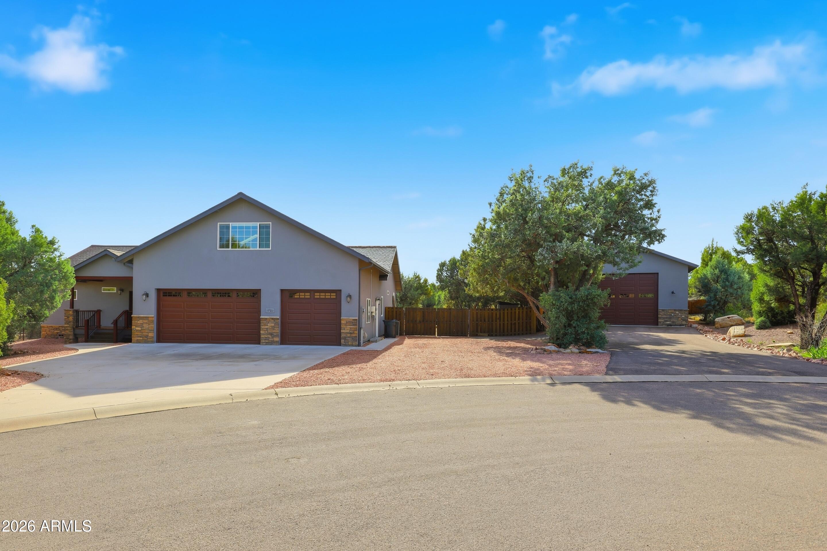 1703 West Dillon Way Payson, AZ 85541 - Photo 56 of 56 a house with trees in the background