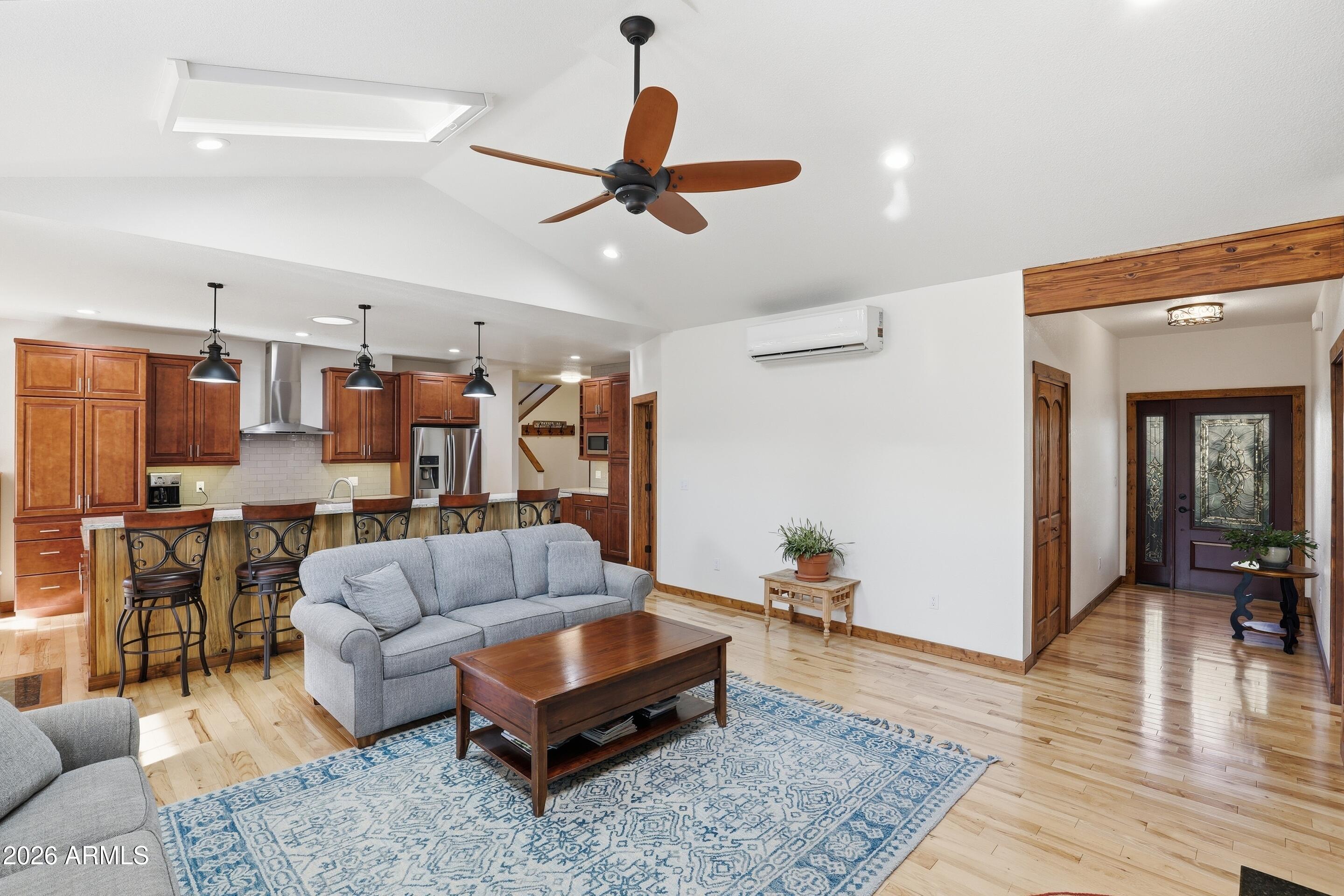 1703 West Dillon Way Payson, AZ 85541 - Photo 8 of 56 a living room with furniture and a wooden floor