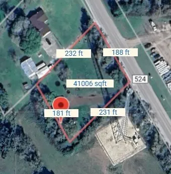 an aerial view of water and sign board