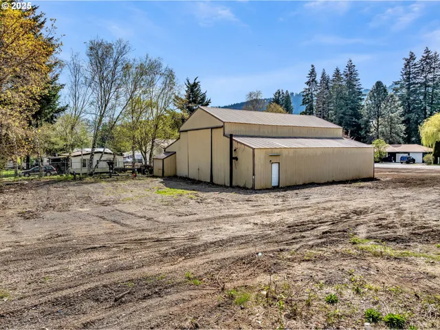 a view of a house with a garden