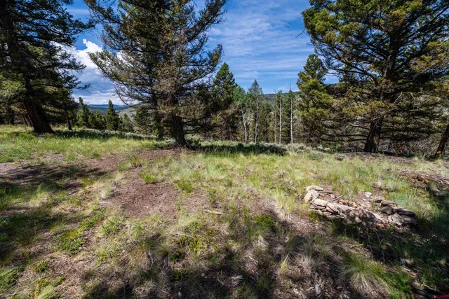 a view of lake with mountain in the background
