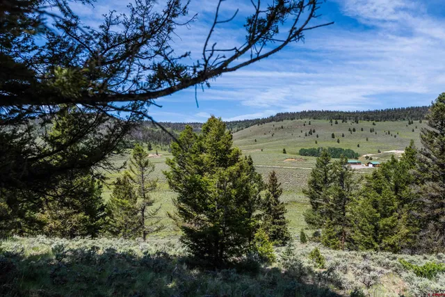 a view of lake with mountain in the back