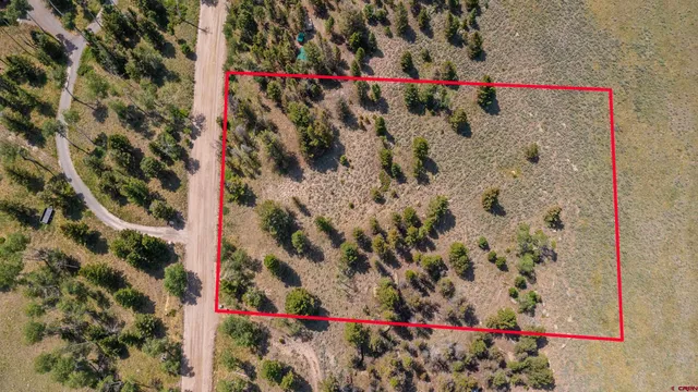 a view of a ocean with a mountain