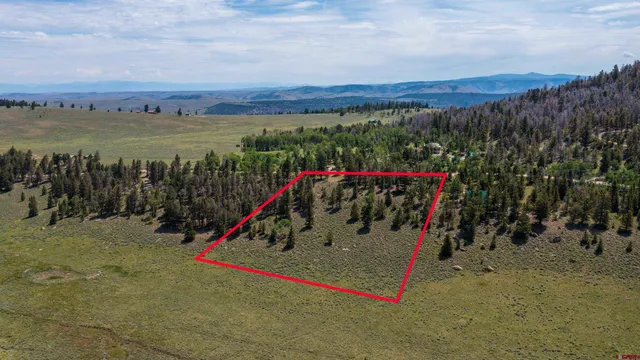 a view of a lake with a mountain in the background