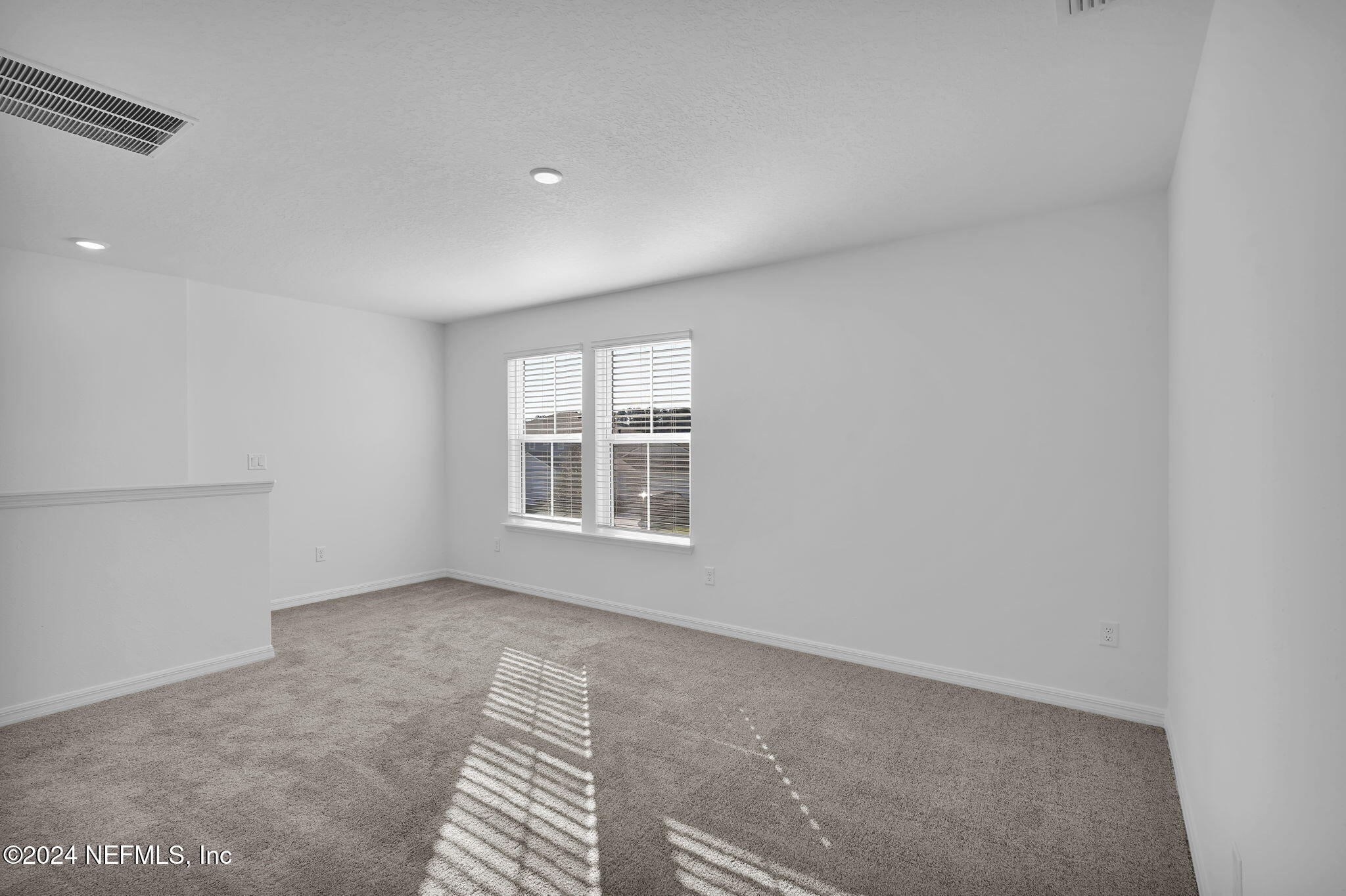 5441 Integrity Way Jacksonville, FL 32244 - Photo 21 of 38 a view of an empty room with a window