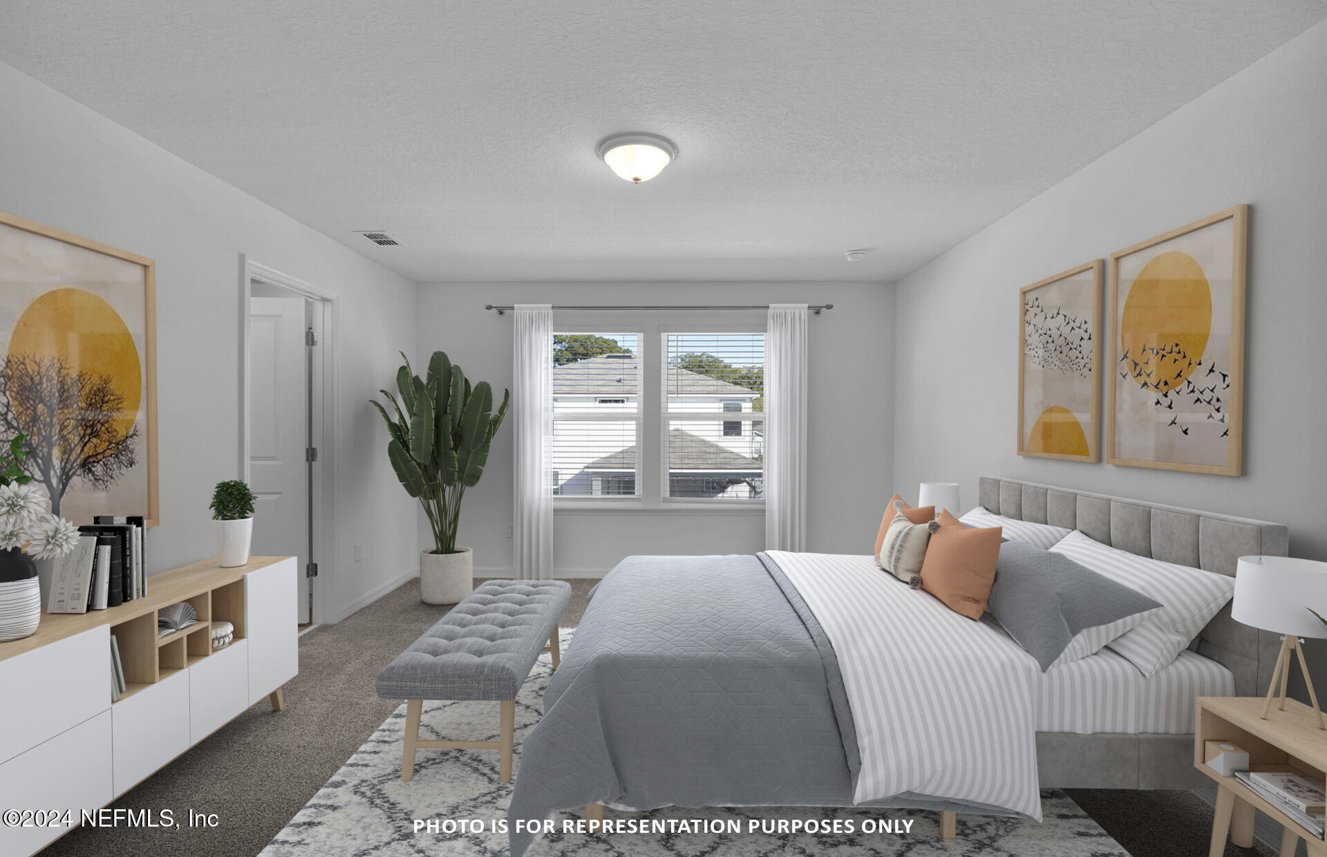 5441 Integrity Way Jacksonville, FL 32244 - Photo 25 of 38 a bedroom with a large bed and a large window