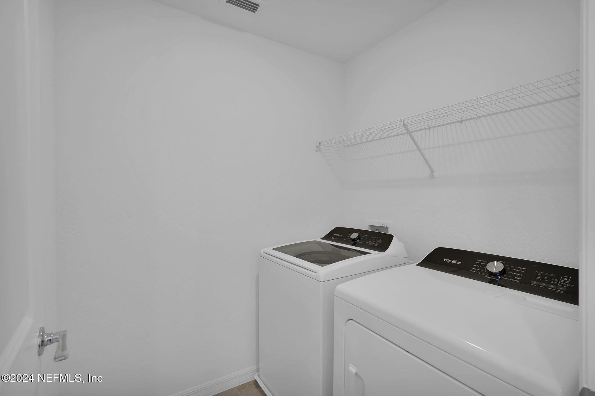 5441 Integrity Way Jacksonville, FL 32244 - Photo 34 of 38 a utility room with dryer and washer