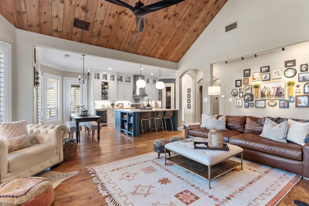 2404 Racheal Drive Heath, TX 75032 - Photo 11 of 40 Open concept flow from living room to kitchen and breakfast area