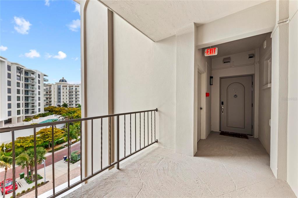 350 Golden Gate Point, Unit 61 Sarasota, FL 34236 - Photo 1 of 48 a view of a hallway with a outdoor space