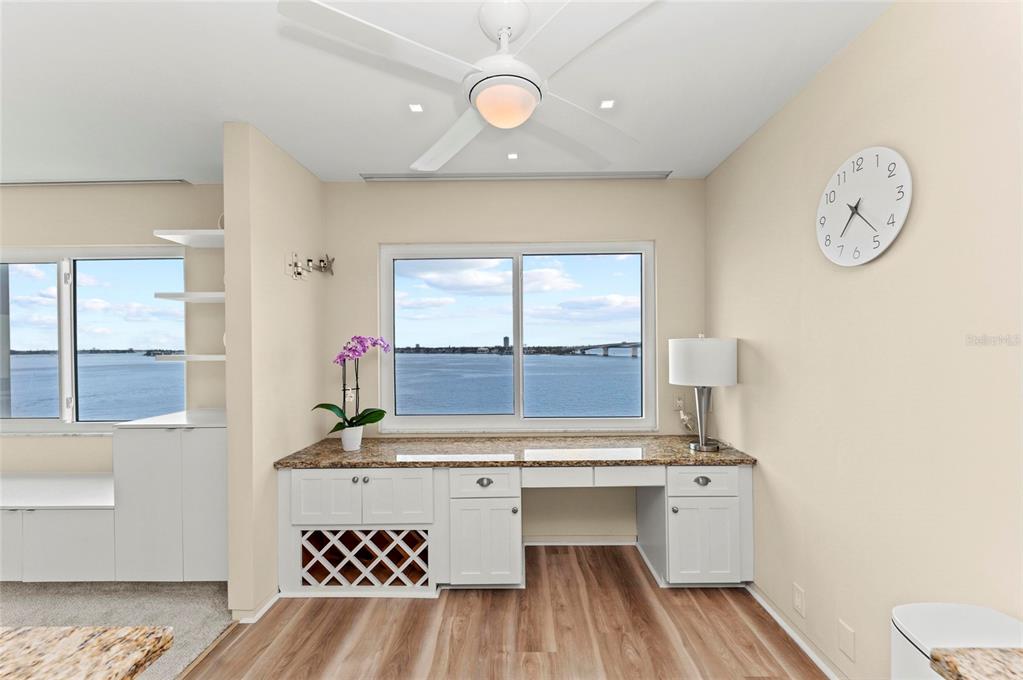 350 Golden Gate Point, Unit 61 Sarasota, FL 34236 - Photo 21 of 48 a room with a table and a window