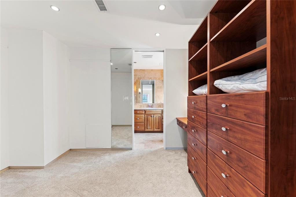 350 Golden Gate Point, Unit 61 Sarasota, FL 34236 - Photo 28 of 48 a view of an empty walk in closet