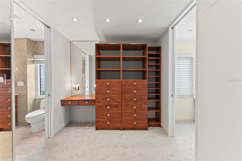 350 Golden Gate Point, Unit 61 Sarasota, FL 34236 - Photo 30 of 48 a room with furniture and window