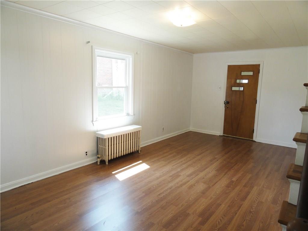 Multi pane windows, new laminate flooring on the first floor and freshly painted throughout