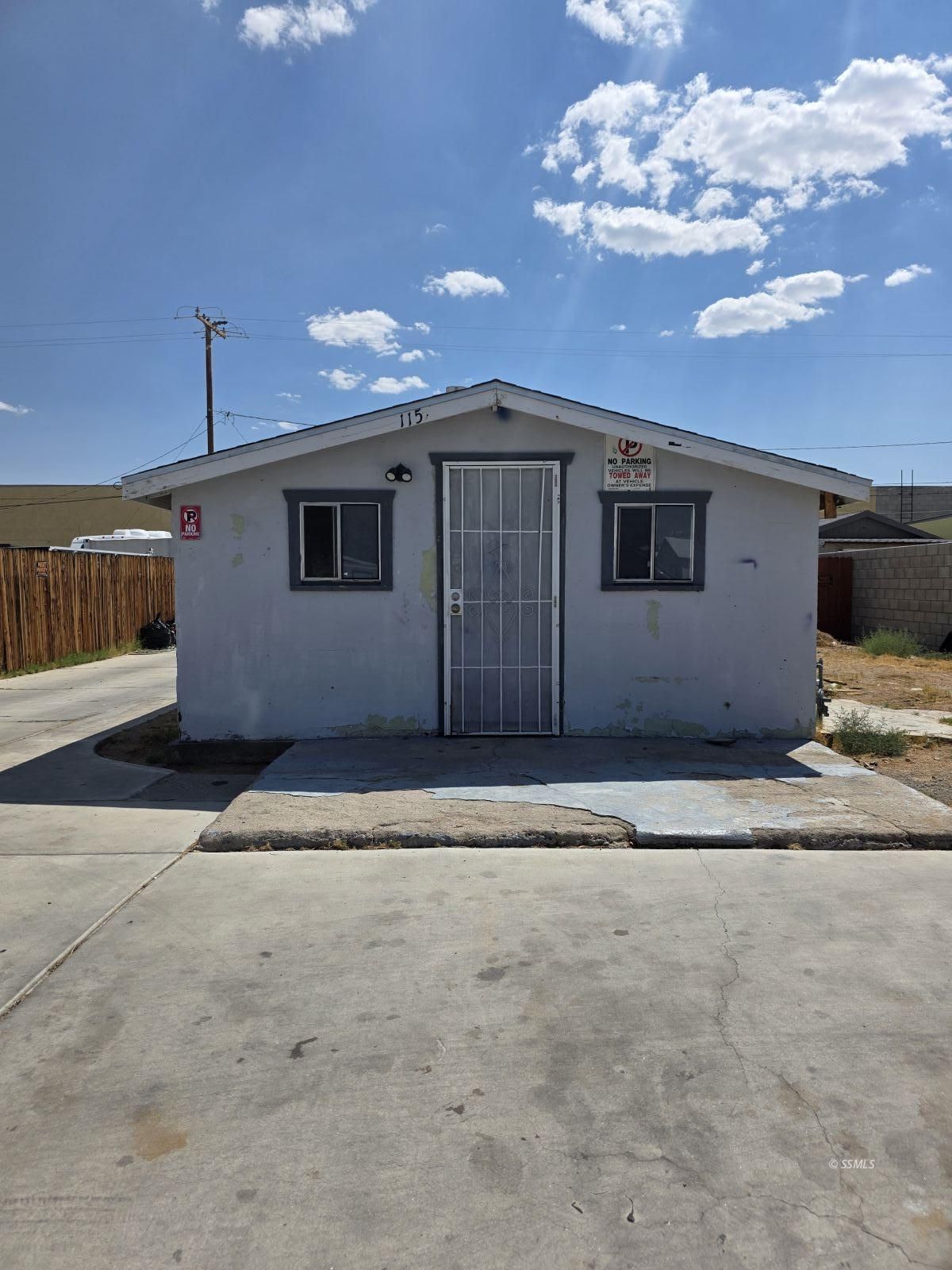 115 West Haloid Avenue Ridgecrest, CA 93555 - Photo 1 of 8 a view of a house with a garage