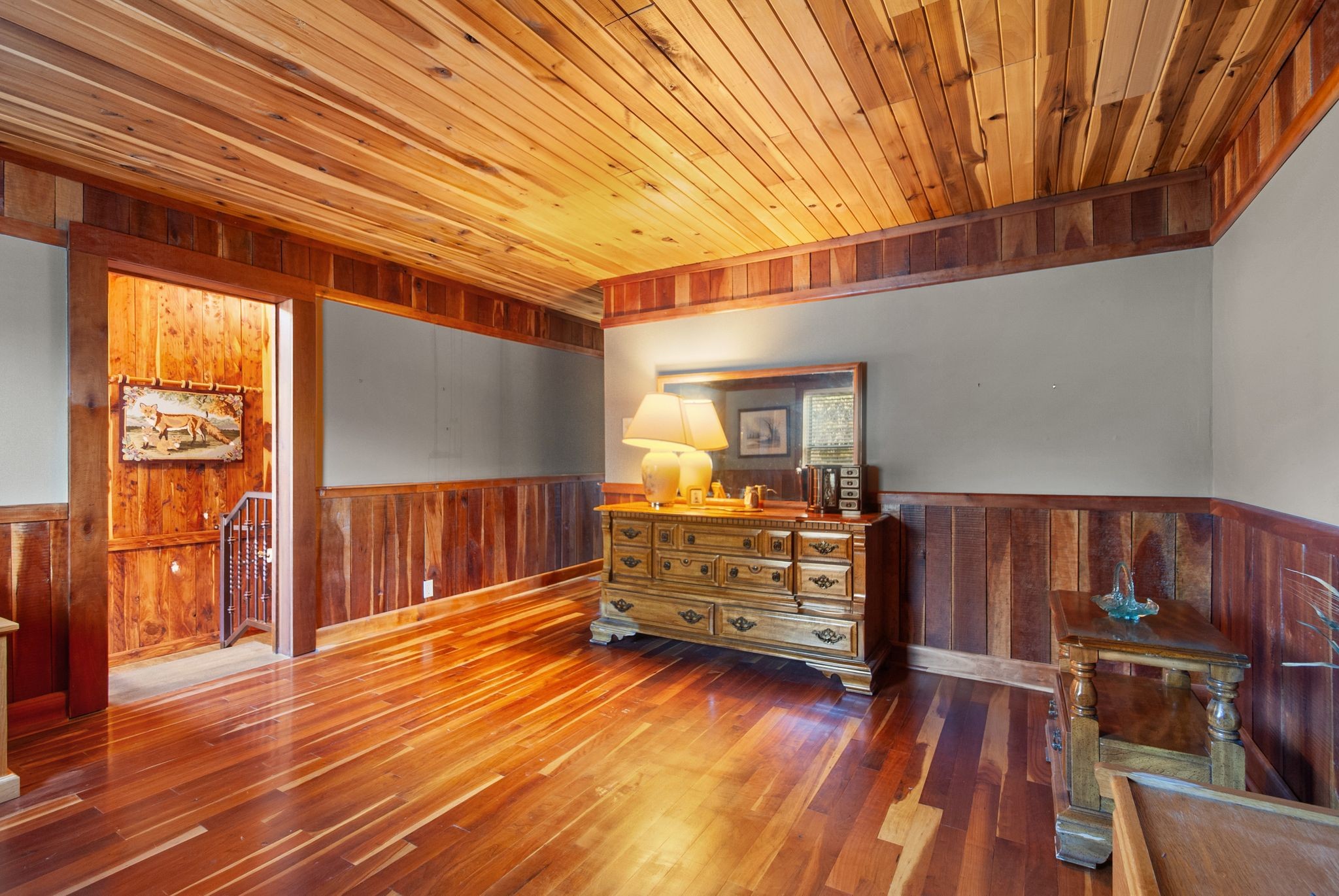 1927 Fowler Hollow Road Lynnville, TN 38472 - Photo 14 of 77 a view of a bedroom with furniture and wooden floor