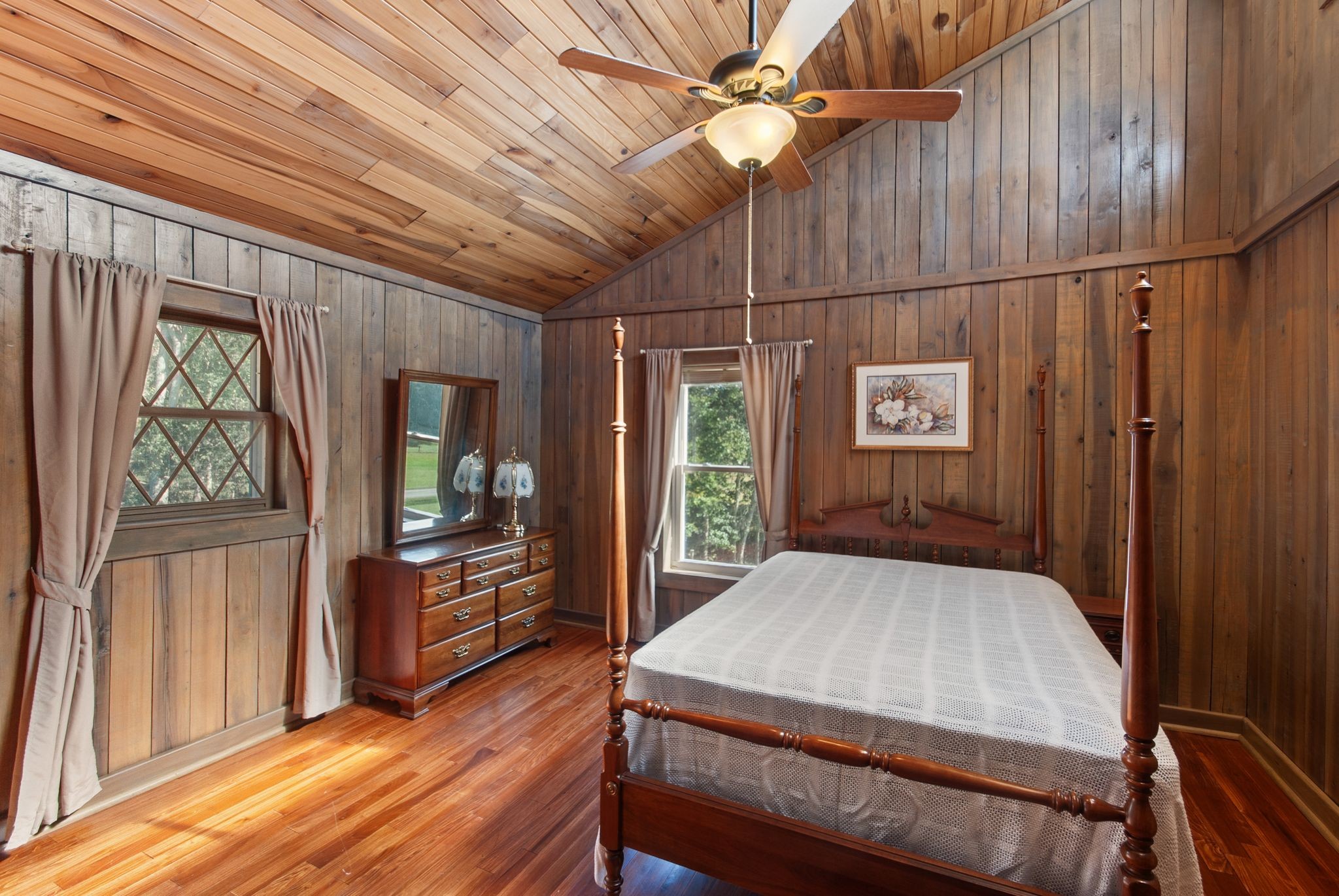 1927 Fowler Hollow Road Lynnville, TN 38472 - Photo 21 of 77 a bedroom with a bed dresser and a large window
