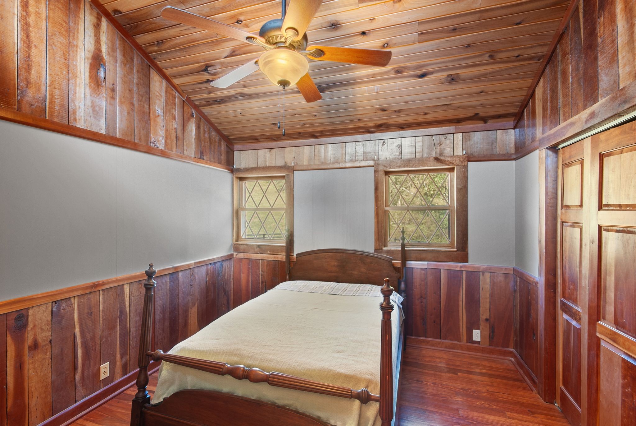 1927 Fowler Hollow Road Lynnville, TN 38472 - Photo 23 of 77 a bedroom with a bed and wooden floor