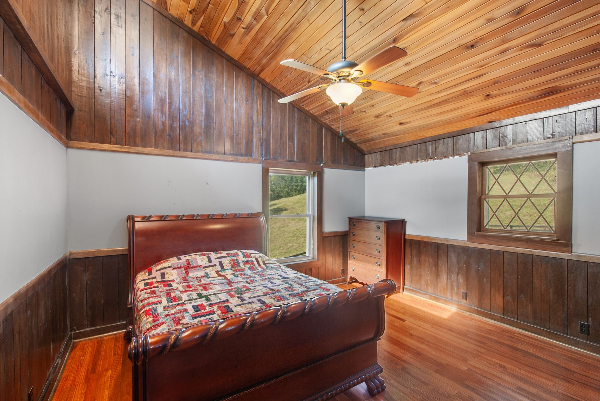 1927 Fowler Hollow Road Lynnville, TN 38472 - Photo 26 of 77 a bed sitting in a bedroom next to a window