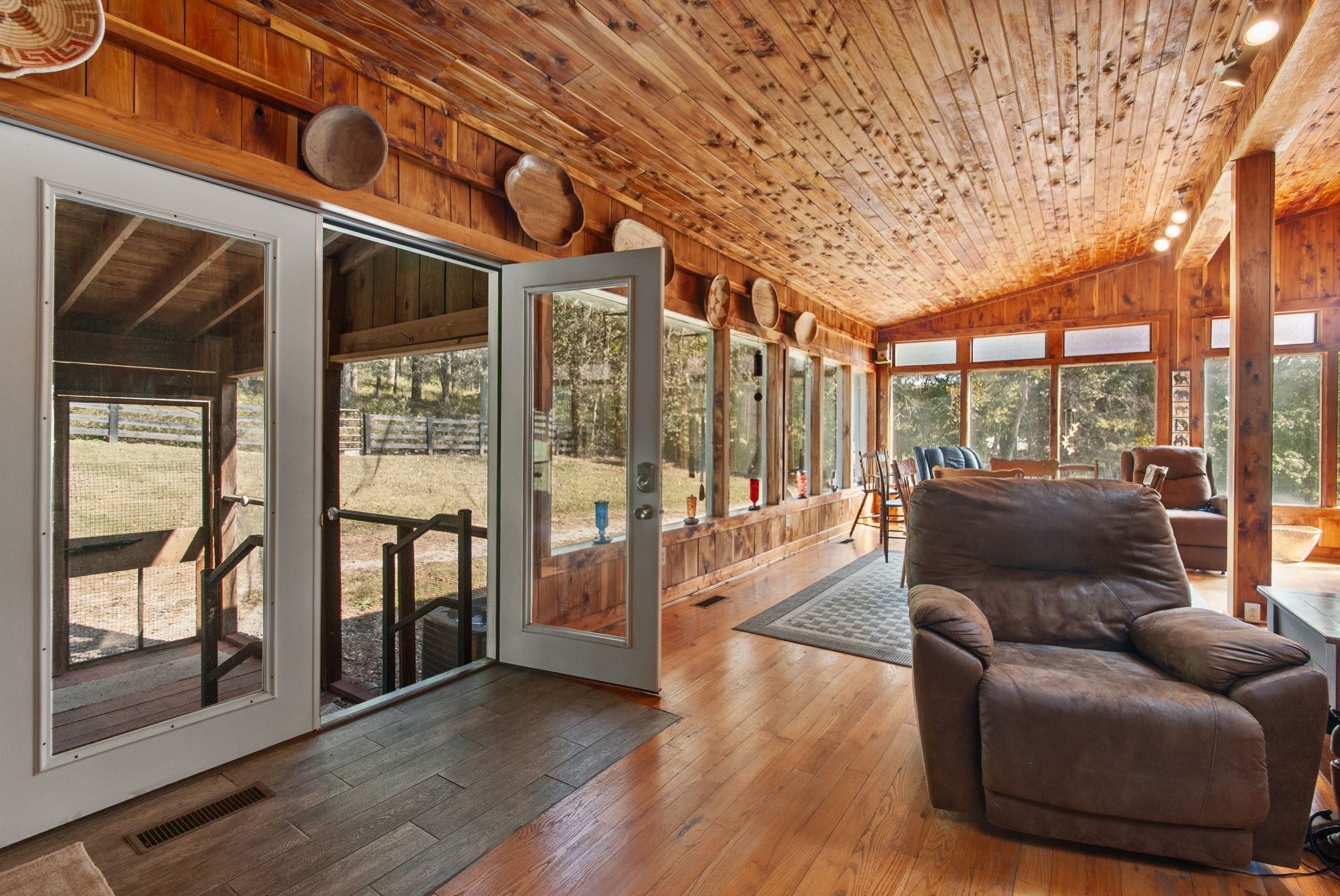 1927 Fowler Hollow Road Lynnville, TN 38472 - Photo 31 of 77 a living room with furniture and a floor to ceiling window