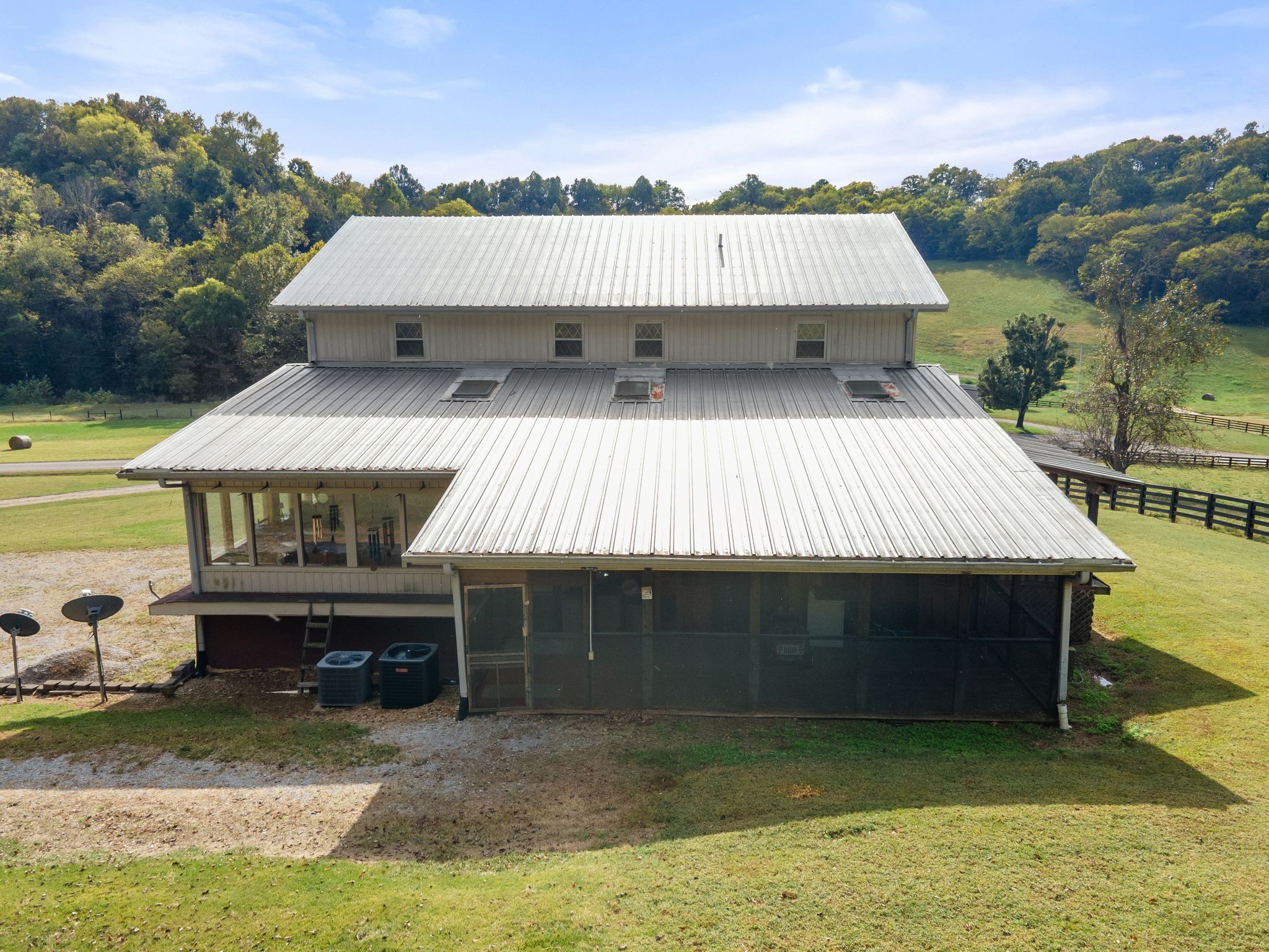 1927 Fowler Hollow Road Lynnville, TN 38472 - Photo 62 of 77 a view of a patio with table and chairs with wooden floor and fence