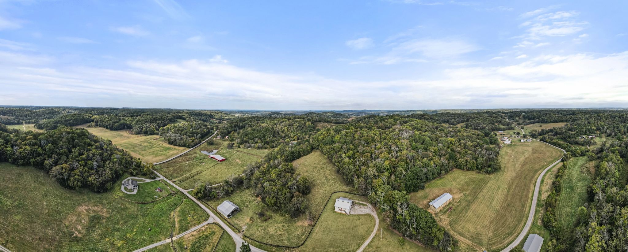 1927 Fowler Hollow Road Lynnville, TN 38472 - Photo 68 of 77 an aerial view of a golf course with houses
