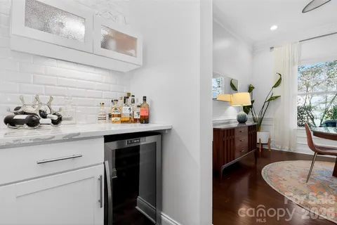 a kitchen with appliances cabinets and a counter top space