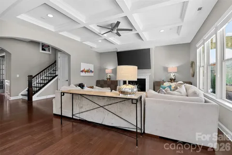 a living room with furniture and a table