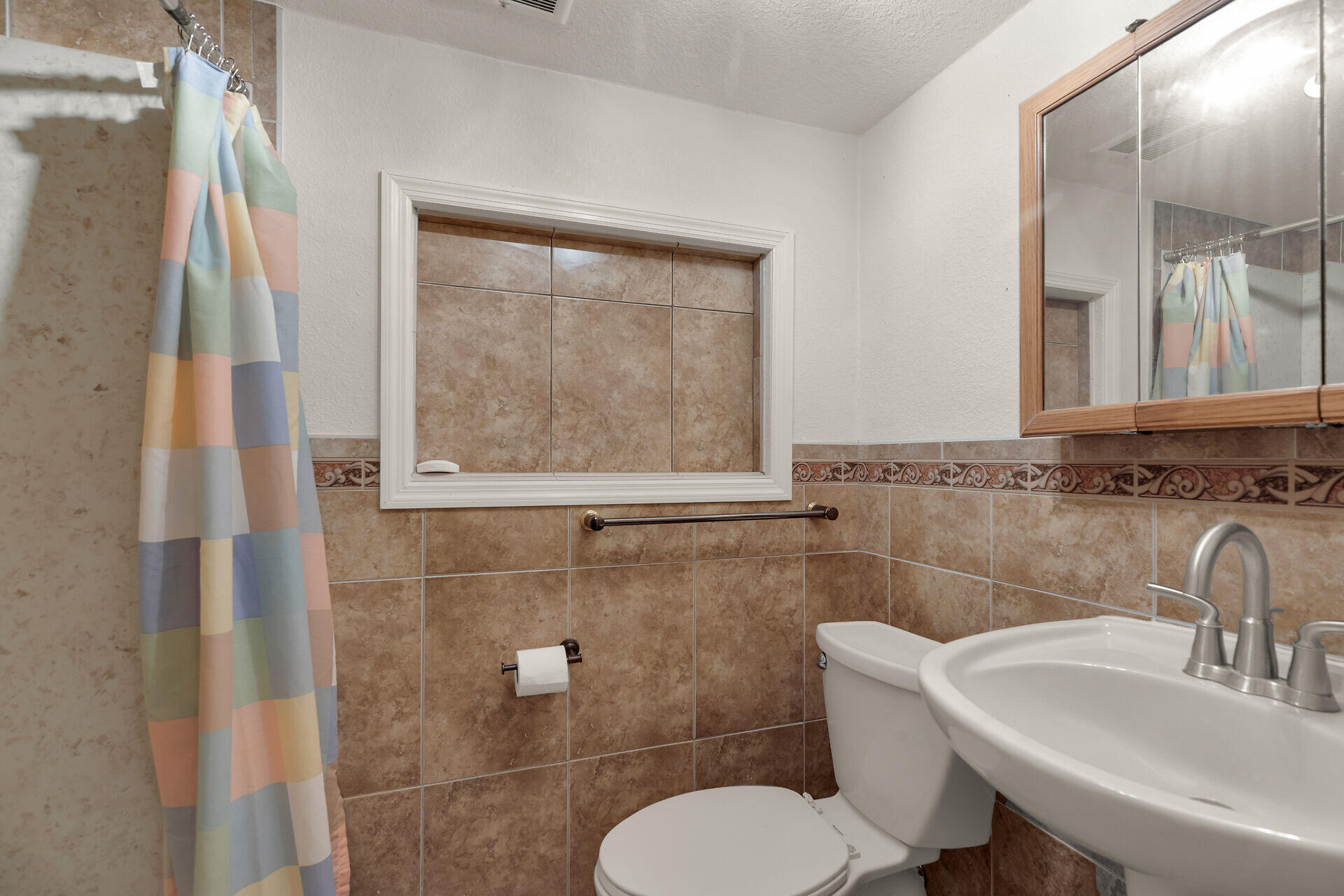 72 1st Court Key Largo, FL 33037 - Photo 21 of 30 a bathroom with a toilet sink and mirror