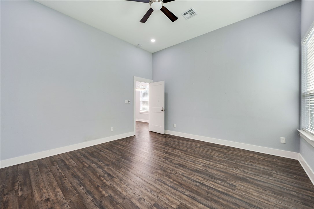 507 Walnut Street Bryan, TX 77803 - Photo 17 of 23 wooden floor in an empty room