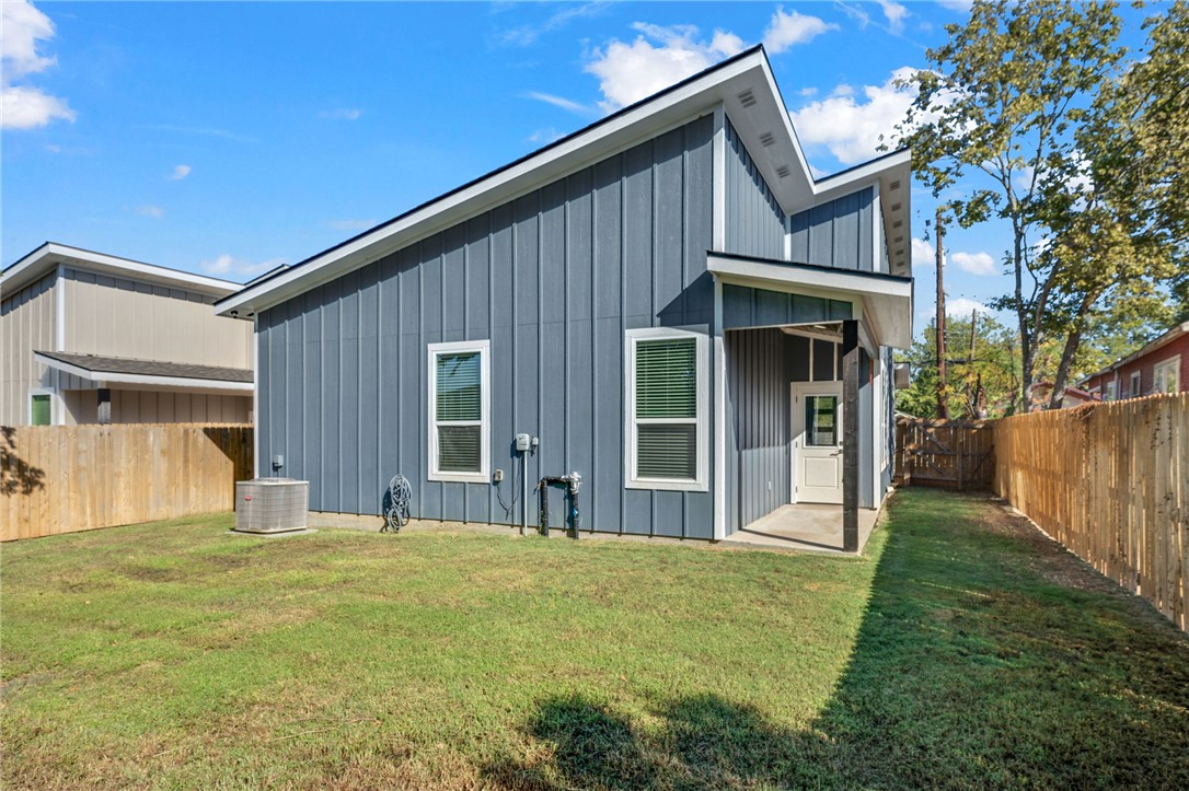 507 Walnut Street Bryan, TX 77803 - Photo 22 of 23 a view of a house with backyard and porch