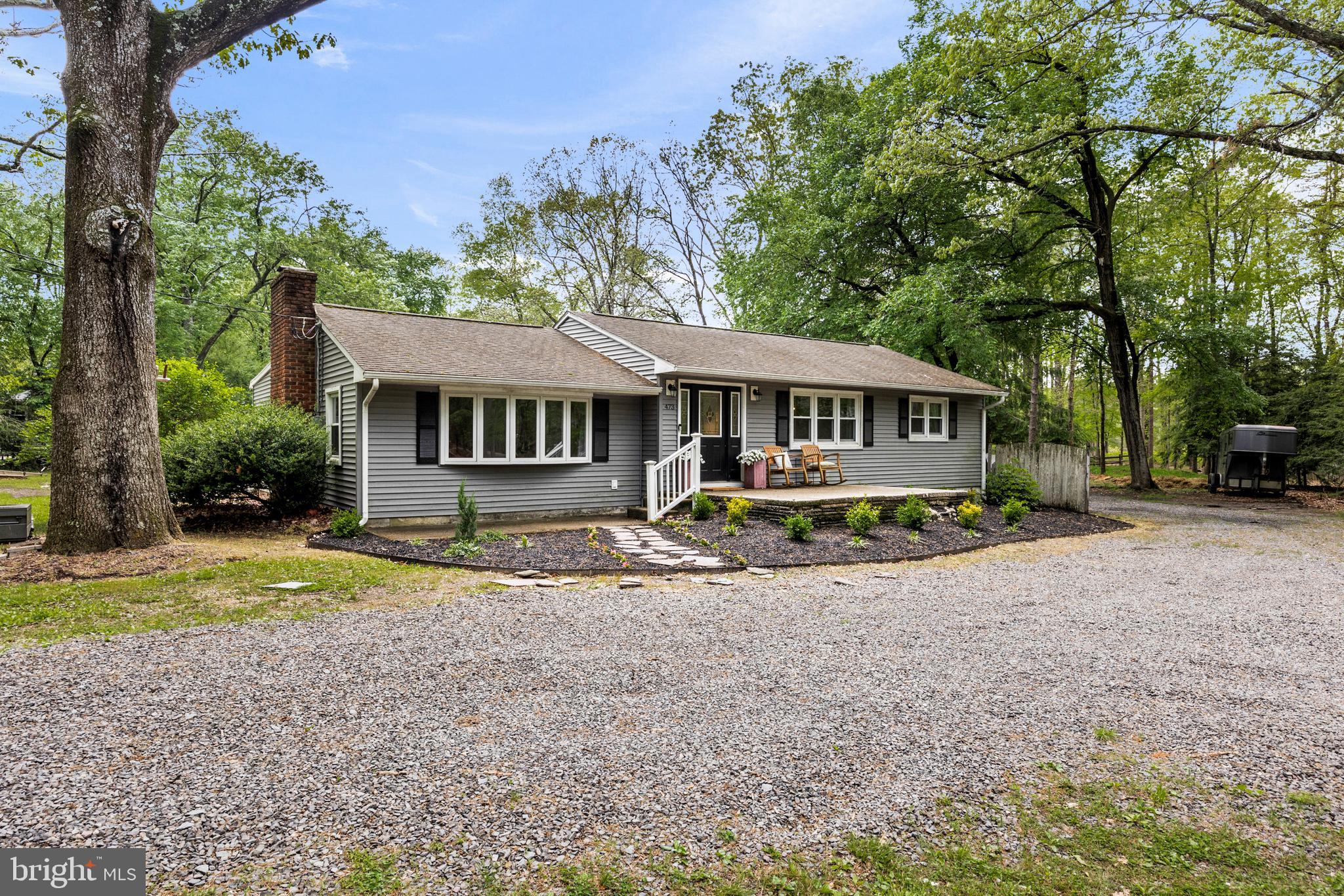 473 Stokes Road Shamong, NJ 08088 - Photo 2 of 49 a view of a house with a yard and sitting area