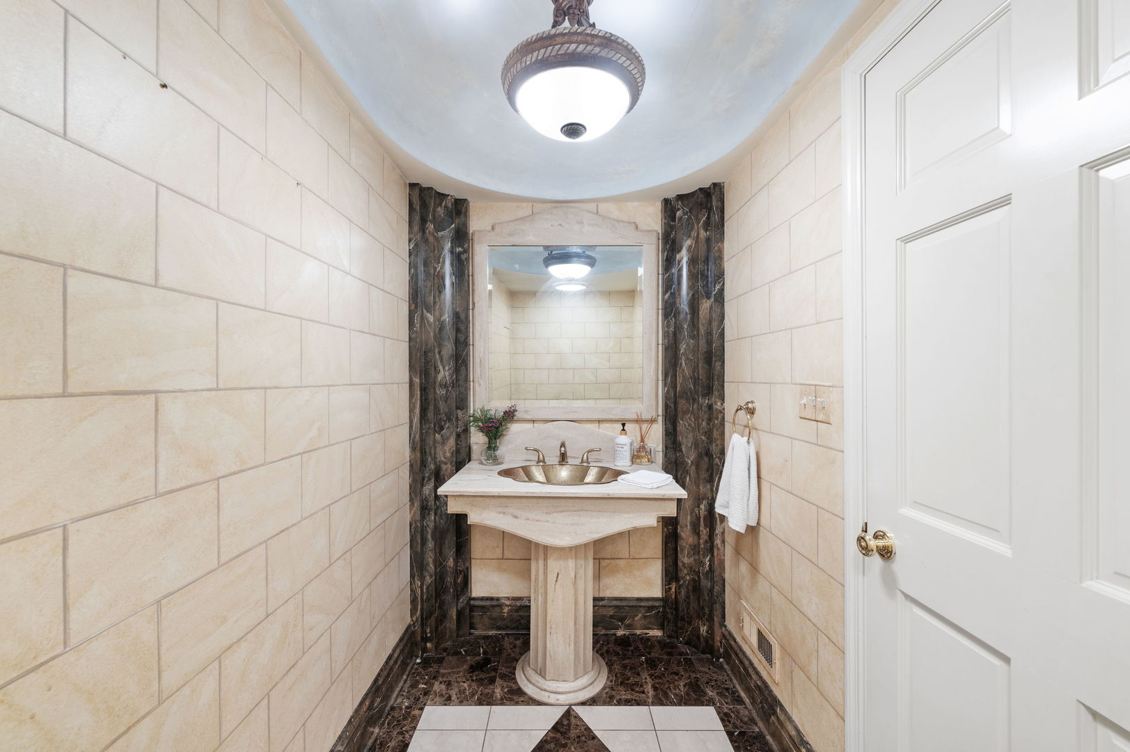 250 South Sheridan Road Lake Forest, IL 60045 - Photo 12 of 30 a bathroom with a sink and a mirror