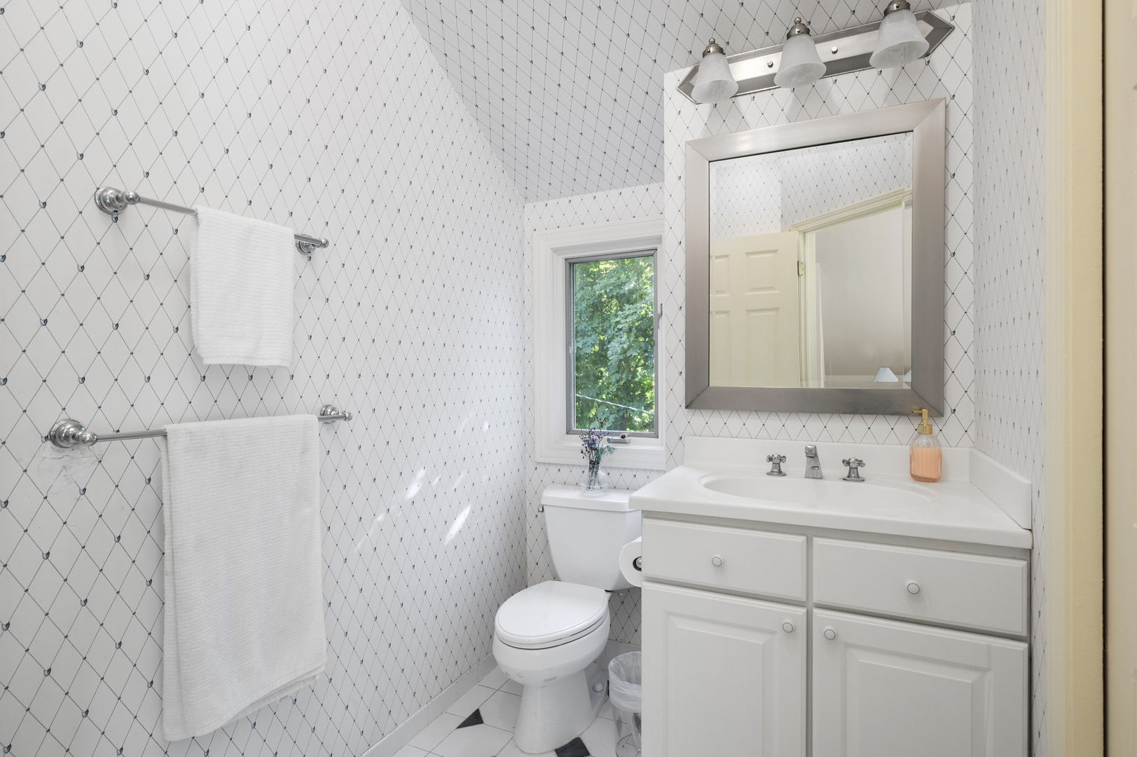 250 South Sheridan Road Lake Forest, IL 60045 - Photo 19 of 30 a bathroom with a sink toilet and shower