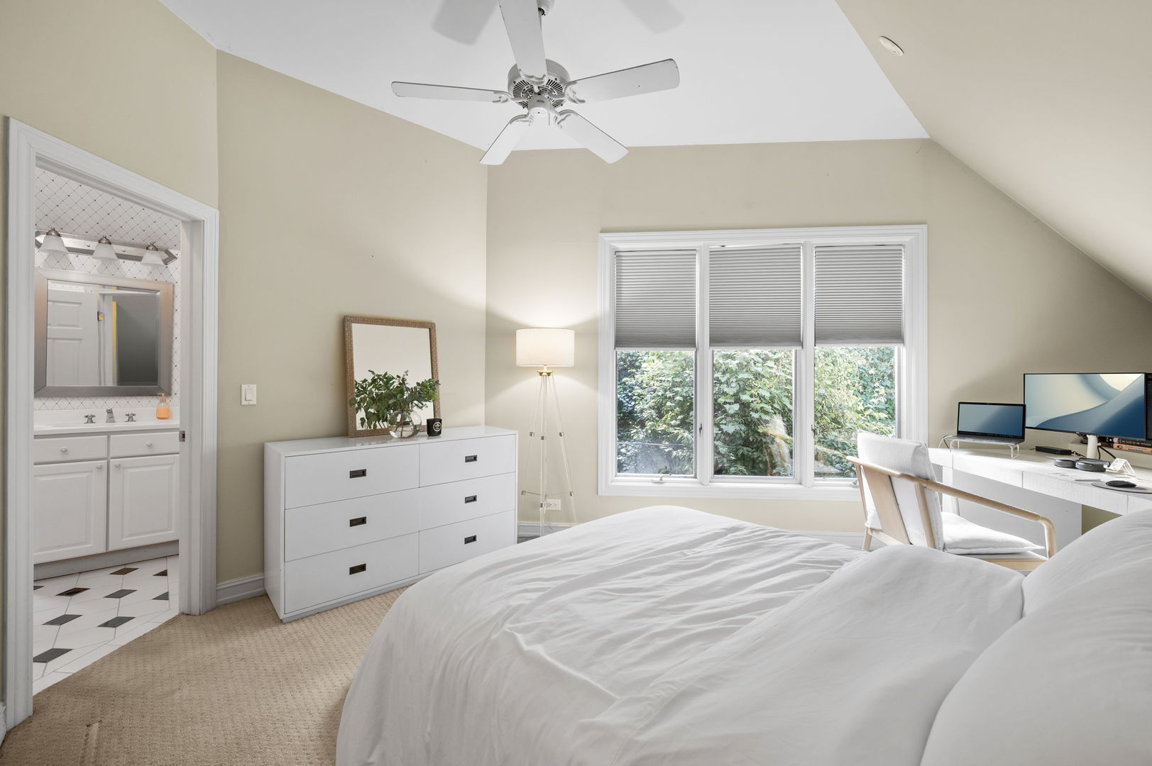 250 South Sheridan Road Lake Forest, IL 60045 - Photo 25 of 30 a bedroom with a bed a window and a chandelier