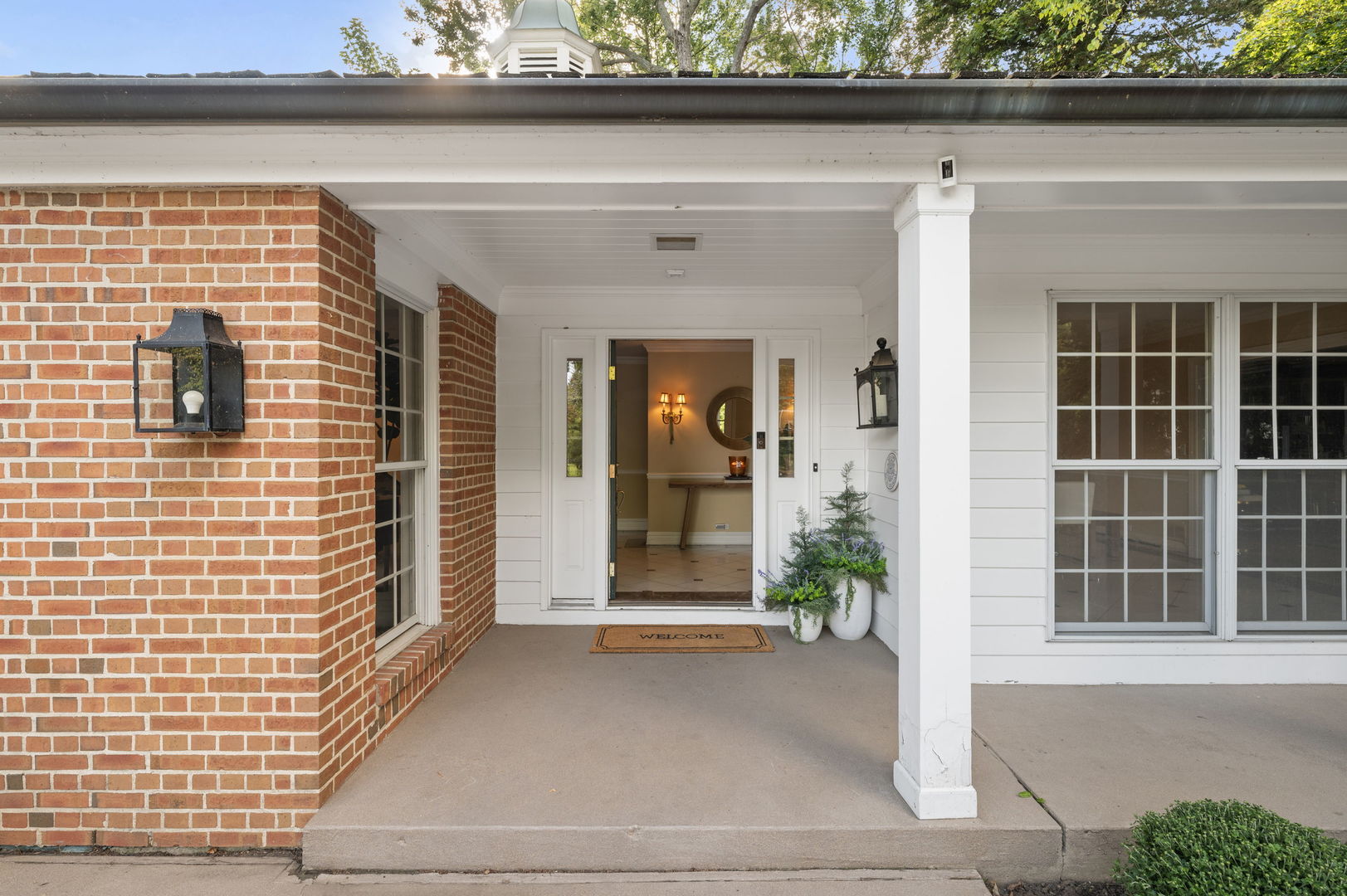 250 South Sheridan Road Lake Forest, IL 60045 - Photo 4 of 30 a front view of a house with a garden