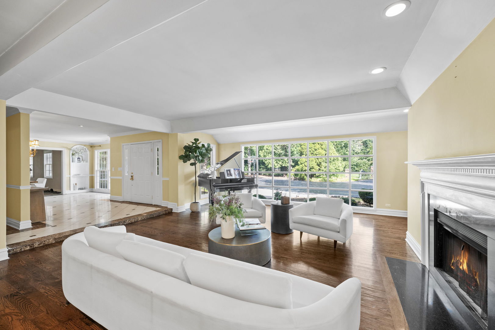 250 South Sheridan Road Lake Forest, IL 60045 - Photo 7 of 30 a living room with fireplace furniture and a large window