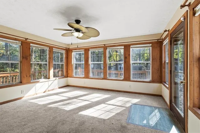 a house with trees in the background