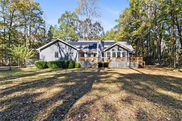 a view of a room with wooden walls