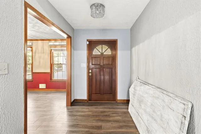 a kitchen with stainless steel appliances granite countertop a stove and a sink