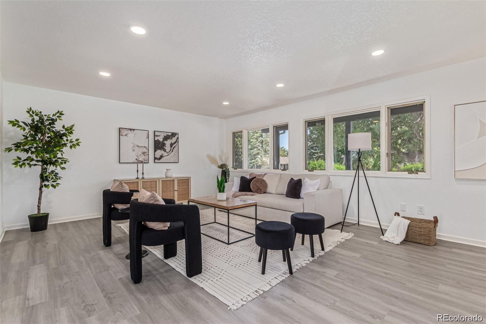 9495 Webster Way Broomfield, CO 80021 - Photo 7 of 32 a living room with furniture and a potted plant