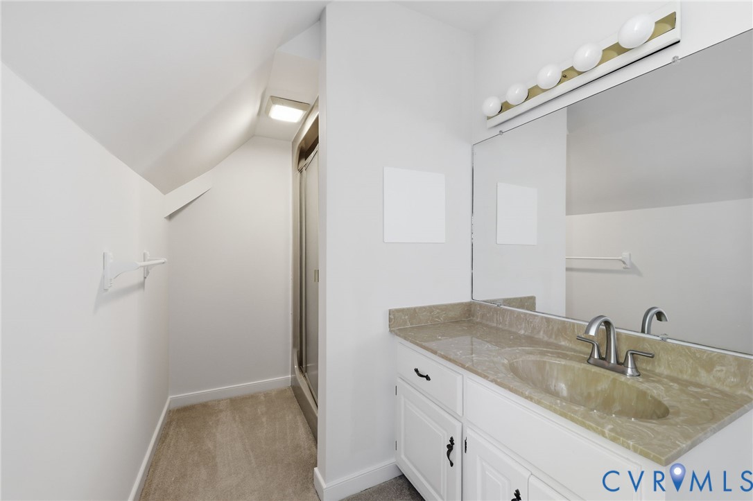 3201 East Brigstock Road Midlothian, VA 23113 - Photo 44 of 72 a bathroom with a sink and a mirror