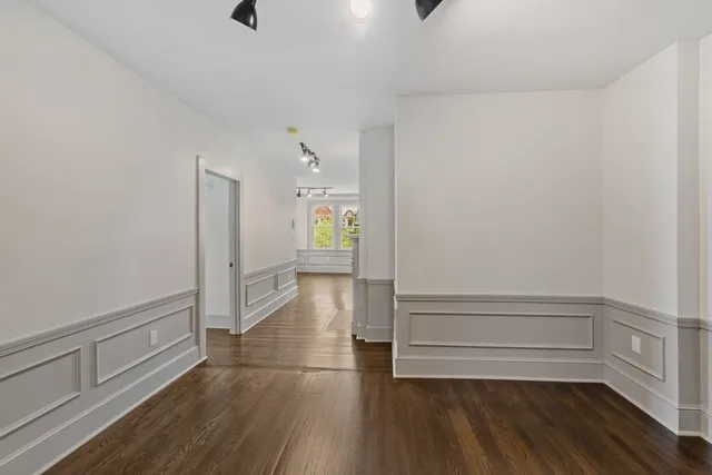 a view of entryway with wooden floor