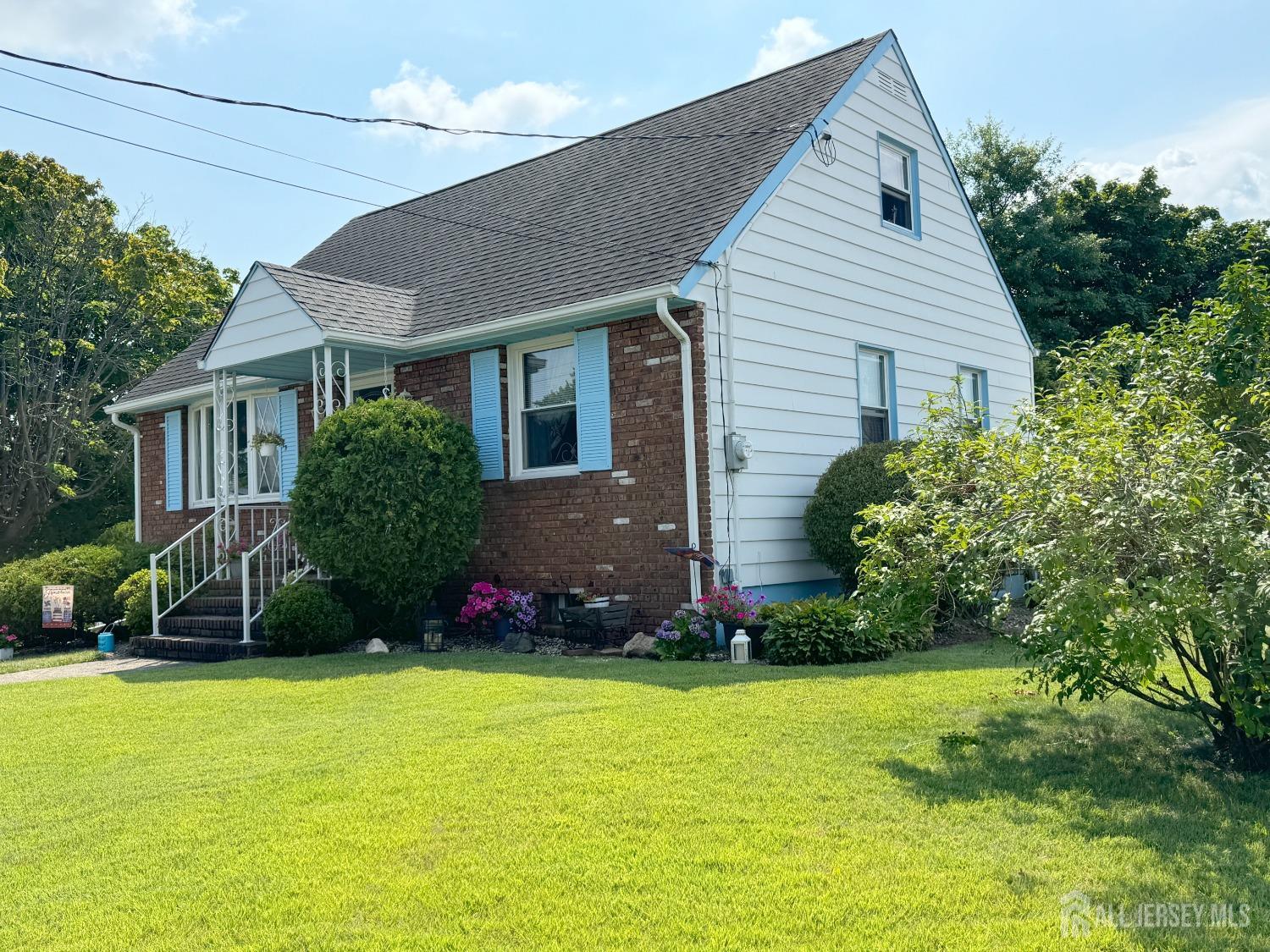 123 Crestview Road Fords, NJ 08863 - Photo 2 of 31 a front view of a house with garden