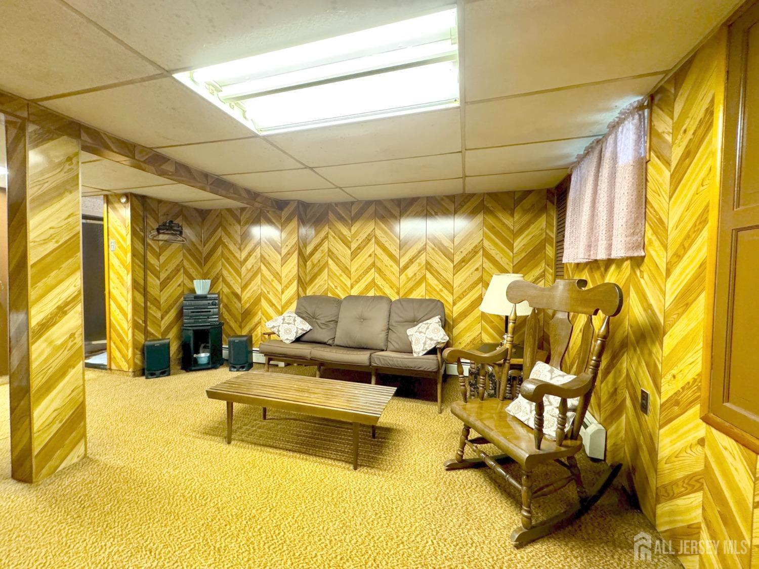 123 Crestview Road Fords, NJ 08863 - Photo 22 of 31 a living room with a couch and furniture