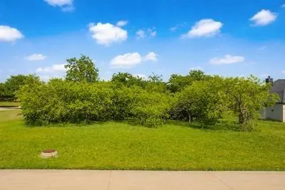 a view of an outdoor space and a yard
