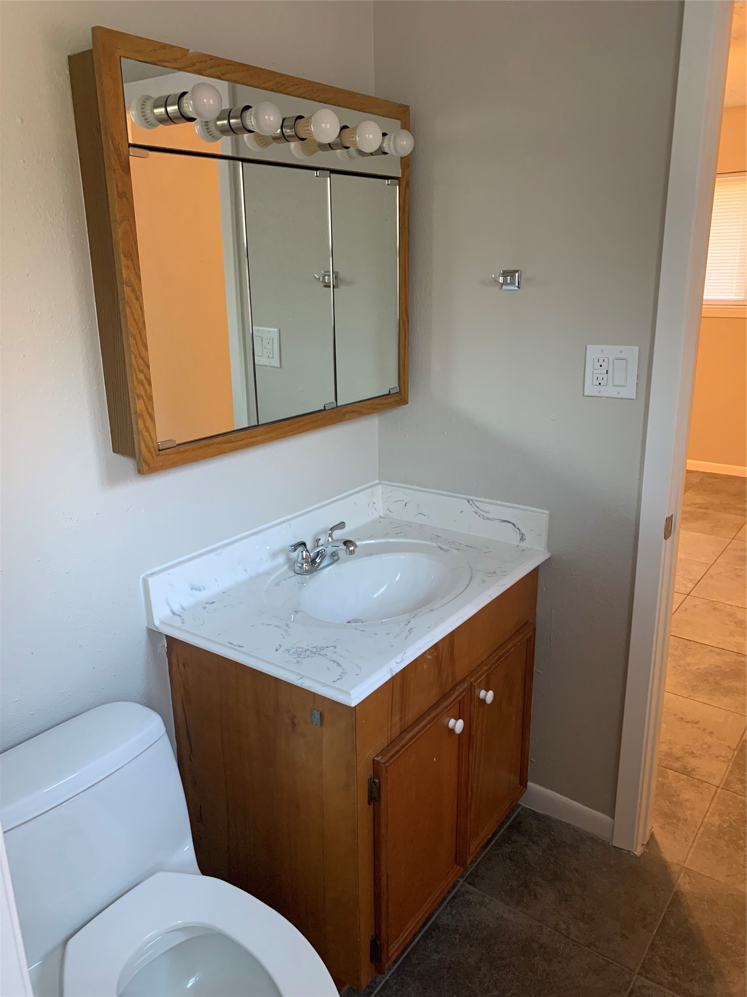 1110 East Rutgers Lane Deer Park, TX 77536 - Photo 12 of 19 Bathroom off of the hallway by first two bedrooms