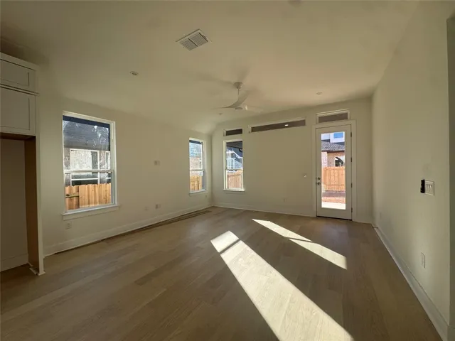 a view of an empty room and window